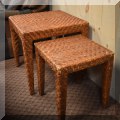 F49. Nesting rattan side tables. 